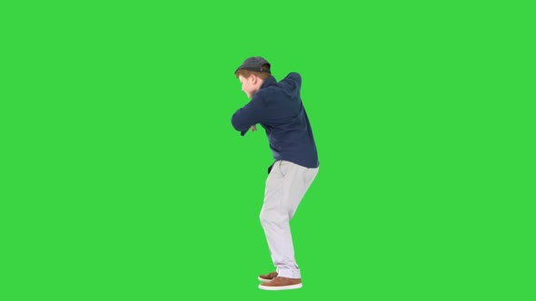 Happy Stylish Boy Doing Some Cool Dancing on a Green Screen Chroma Key alt
