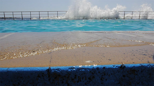 Seaside Pool with Ripples and Wave Splashing