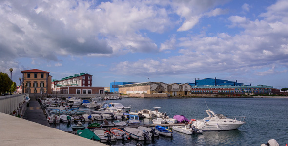 Cloudy Sky with Boats at Port