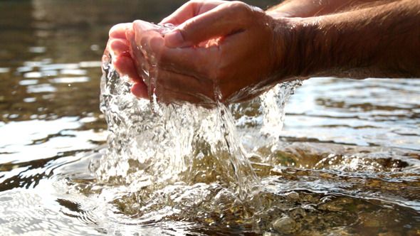 Collecting Water with Hands in the Sea by creativesight | VideoHive