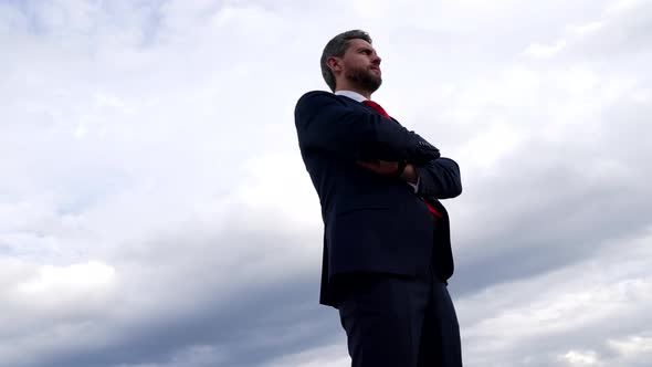 Professional Unshaven Ceo Crossed Hands on Sky Background Confidence