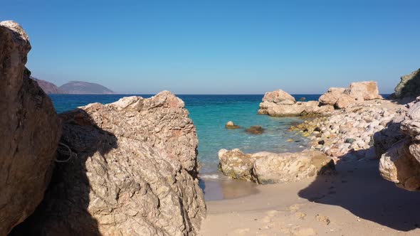 Rocky Coastline of Maldives Island with Clear Turquoise Water alt