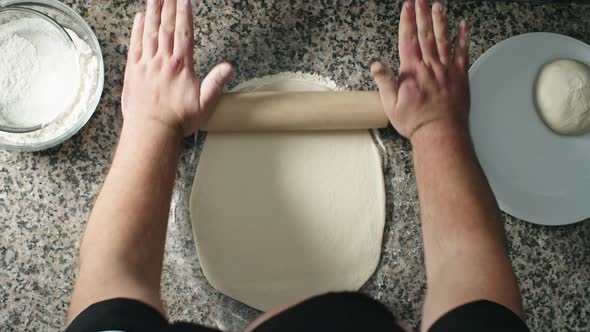 Rolling Out Dough on Floured Surface alt
