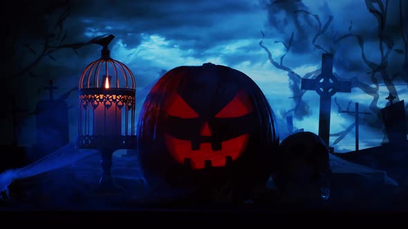 Scary laughing pumpkin and an old skull over the frightening gothic background. alt