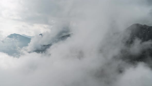Clouds in Mountains alt