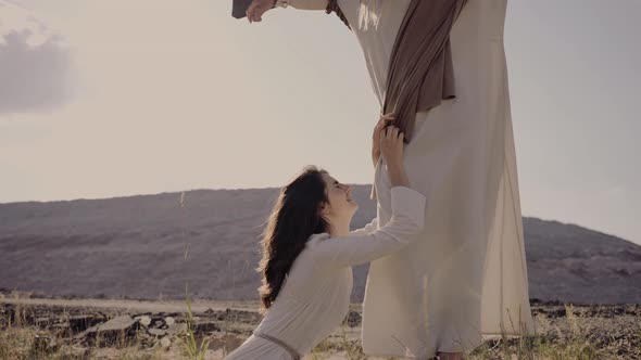 Mary Falls at Jesus' Feet and Mourns His Death alt