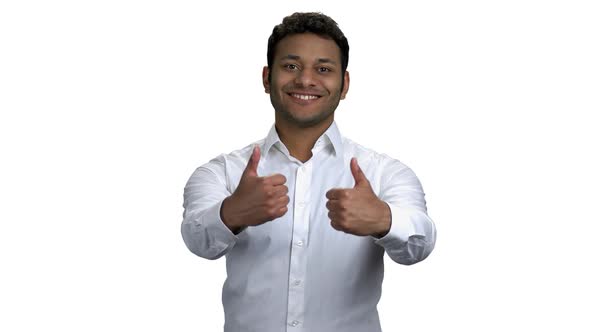Smiling Africanamerican Businessman Showing Two Thumbs Up alt