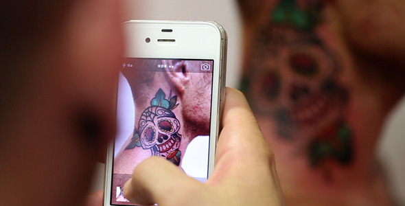 Taking Tattoo Pictures With The Phone alt