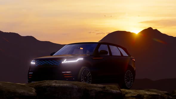 Black Luxury Off-Road Vehicle Progressing in the Mountainous Area at Sunset