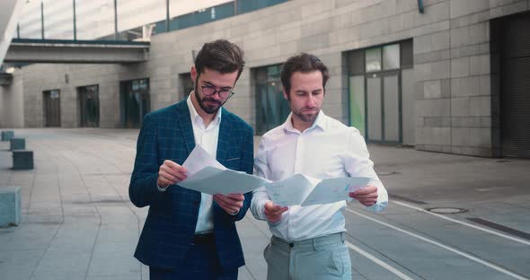 Caucasian Man Personal Assistant Businessman Standing in Street Business Center Outdoor and Showing alt