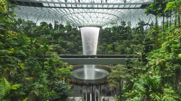 Time lapse Waterfall at Shopping mall Jewel in Changi Airport. alt