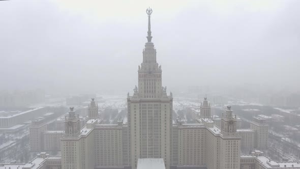 Aerial Footage of Moscow State University in Winter Cloudy and Snowy Weather