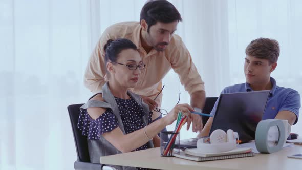 Group Meeting of Creative Business People Designer and Artist at Office Desk alt