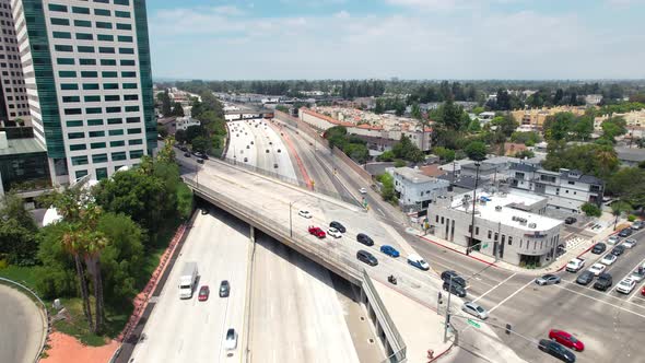 Route 134 Freeway in Burbank, California - ascending aerial view in the downtown area and an overpas alt