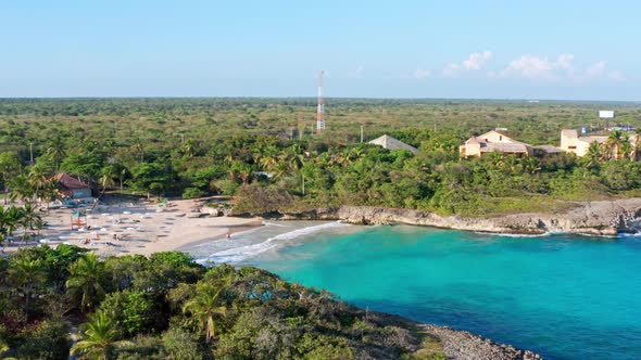 Beautiful paradise bay of Caribe beach. Aerial circling alt