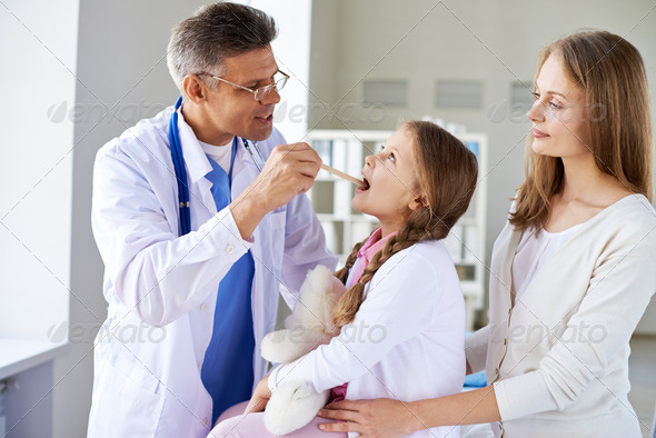 Checking up throat - Stock Photo - Images