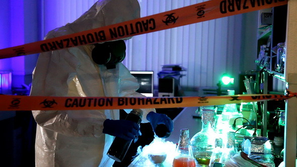 Scientist behind the caution tape.