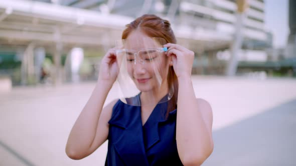 Office Girl in the city (Bangkok), wearing face shield