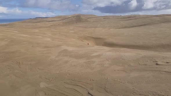 Aerial footage of Giant sand dunes in New Zealand