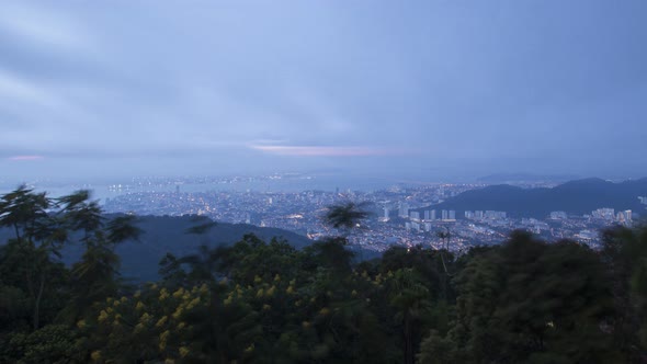 Timelapse Misty fog flow toward dense tropical rainforest Penang Hill alt