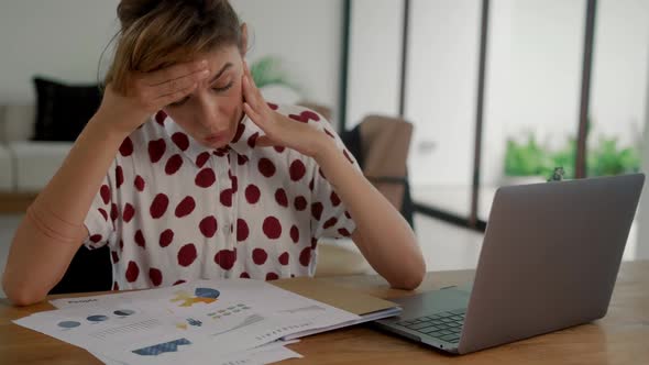 Depressed Woman Feeling Worried About Incorrect Data Entered Doing Paperwork alt