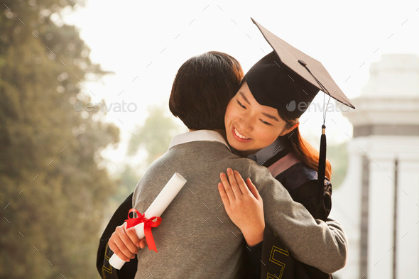 Mother and Graduate Hug - Stock Photo - Images