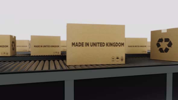 Boxes with MADE IN United Kingdom Text on Conveyor alt