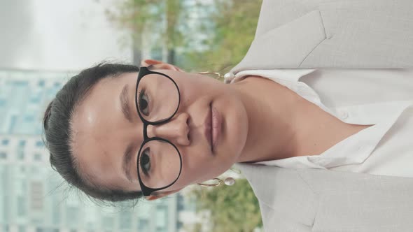 Close Up Vertical Portrait of Businesswoman Outside alt