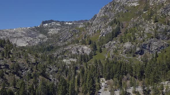 This is drone footage taken at Lake Tahoe California. The Mountain range is in the video is directly alt