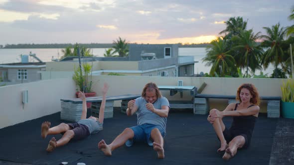 Cinematic Shot of Happy Smiling Family with Children Doing Exercises of Gymnastics Together at alt