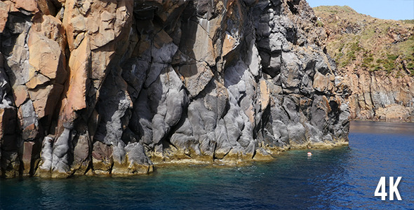 Rocks, Sea And Diver alt