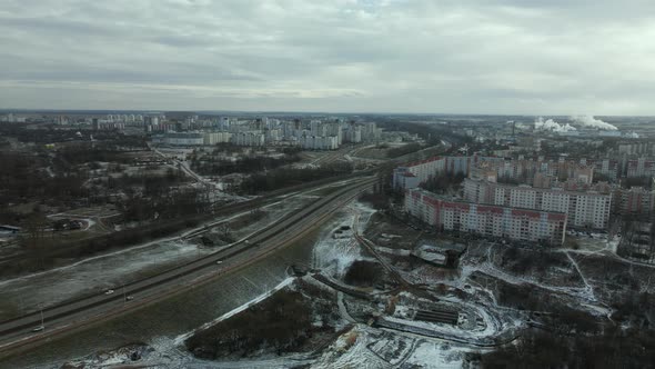 Construction site in a city vacant lot. Close to populated urban areas. alt