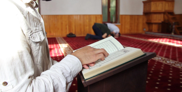 Reading Quran In Mosque alt