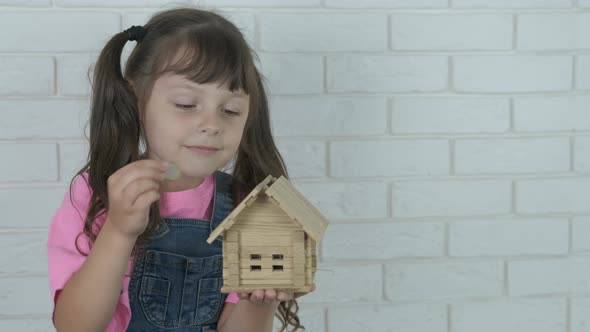 Child insert coins. alt