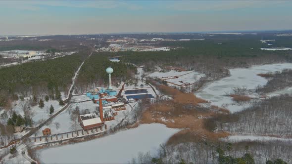 Aerial View of Modern Little Industrial Sewage Treatment Plant at Work in Winter Season alt