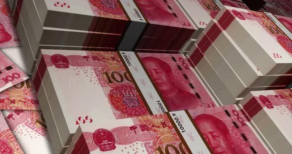 China Yuan 100 banknote packs - flying over CNY money stack
