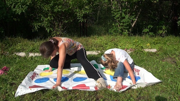 Mother With Her Daughter Play Twister 1