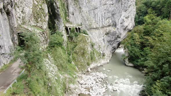 Aerial view of old abandoned road to Krasnaya Polyana in Sochi. Russia. alt