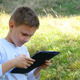 Happy Young Boy Using Tablet - VideoHive Item for Sale