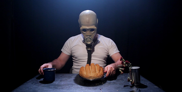 Gas Mask Man With Bread