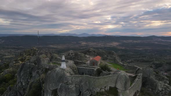 Camera captures the majesty of the Portuguese landscape from the top of Monsanto Castle. alt