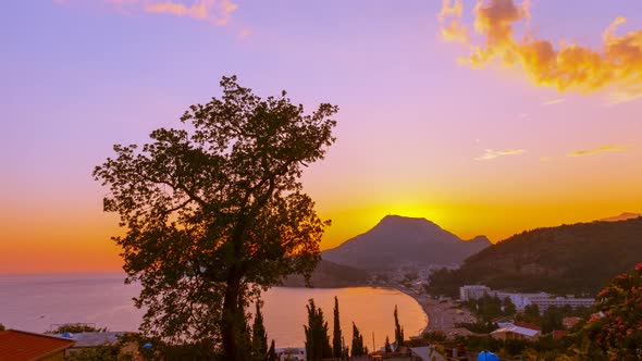 Time lapse sunset on Adriatic sea coastline in the Sutomore city, Montenegro