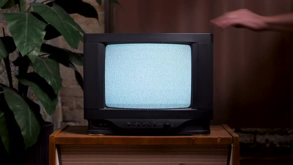 Man Hitting Old TV Screen Close Up