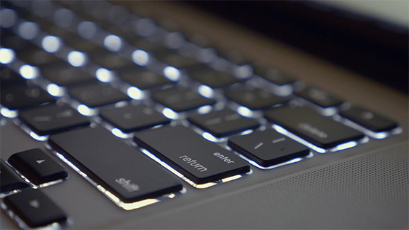 Pressing Enter on an Illuminated Keyboard