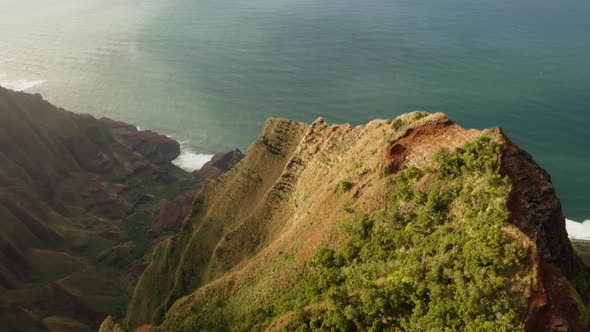 Scenic Aerial View Over Hawaiian Coastal Range Against the Background of Pacific Ocean alt