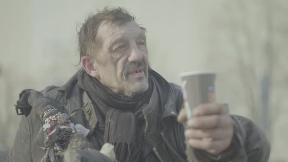 Beggar Homeless Man Tramp. Poverty. Vagrancy. Kyiv. Ukraine. alt