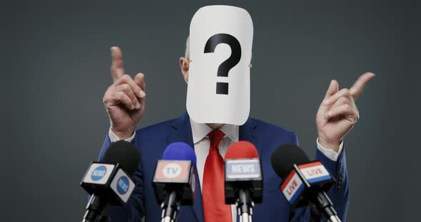 Politician with hidden face at the press conference, he is hiding his identity