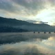 Beautiful Moving Fog In Mountain Lake With Boats Sailing Peacful Morning Scenery Slow Motion - VideoHive Item for Sale