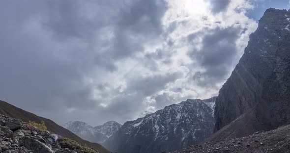 Timelapse of Epic Clouds in Mountain Valley at Summer or Autumn Time, Wild Endless Nature and Snow alt