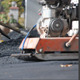 Asphalt Paver Applying Asphalt on the Way - VideoHive Item for Sale